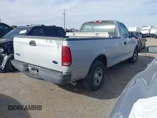 2002 Ford F-150 XL with VIN 3FTRF17212MA13777, listed as a IAAI auction lot 40977321 with 1 mi miles. Bid and sale history available at carsss.com. Image 4.