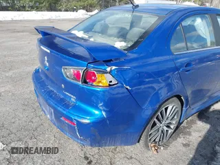 2017 Mitsubishi Lancer ES with VIN JA32V2FW1HU001811, listed as a IAAI auction lot 41378932 with 130,316 mi miles. Bid and sale history available at carsss.com. Image 18.