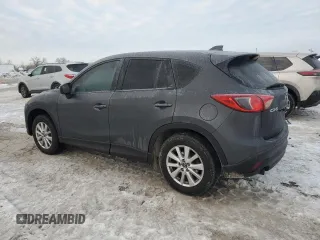 2015 Mazda CX-5 Sport with VIN JM3KE2BE2F0541436, listed as a Copart auction lot 87596785 with 197,310 mi miles and Salvage Title. Bid and sale history available at carsss.com. Image 2.