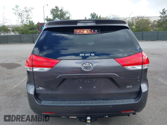 2014 Toyota Sienna XLE with VIN 5TDYK3DC7ES517206, listed as a IAAI auction lot 41945572 with 128,743 mi miles and . Bid and sale history available at DreamBid. Image 17.