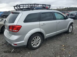 2013 Dodge Journey SXT with VIN 3C4PDDBG4DT571262, listed as a Copart auction lot 86795494 with 163,699 mi miles and Salvage title. Bid and sale history available at DreamBid. Image 3.