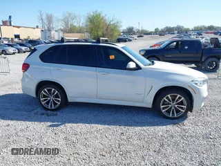 2015 BMW X5 xDrive50i with VIN 5UXKR6C5XF0J76697, listed as a IAAI auction lot 41953074 with 141,377 mi miles and . Bid and sale history available at DreamBid. Image 12.