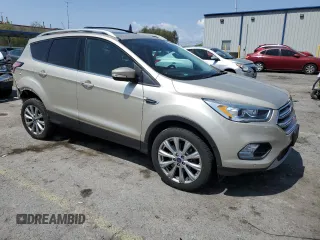 2018 Ford Escape Titanium with VIN 1FMCU9J91JUB44813, listed as a Copart auction lot 59920265 with 63,008 mi miles and Salvage title. Bid and sale history available at DreamBid. Image 4.