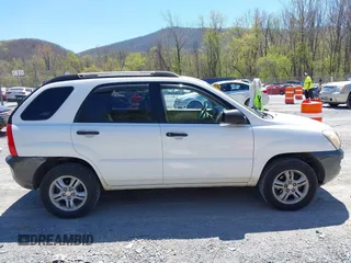 2006 Kia Sportage LX with VIN KNDJF723567151614, listed as a IAAI auction lot 42022102 with 128,564 mi miles and . Bid and sale history available at carsss.com. Image 13.