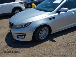 2015 Kia Optima EX with VIN 5XXGN4A73FG436223, listed as a IAAI auction lot 41970418 with 174,002 mi miles. Bid and sale history available at carsss.com. Image 6.