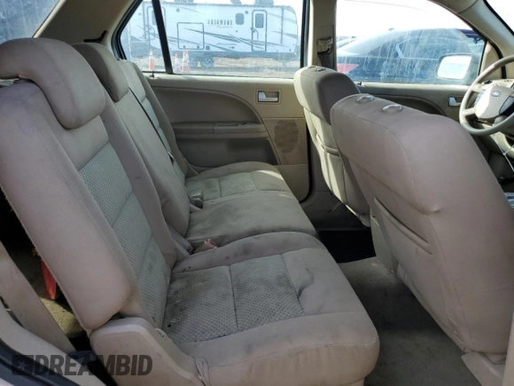 2006 Ford Freestyle SE z VIN 1FMZK01116GA24876, wystawiony jako Copart lot #46689905 z przebiegiem 189 401 mil mil oraz Szkoda całkowita • Salvage title. Historia ofert i sprzedaży dostępna na DreamBid. Obrazek 11.