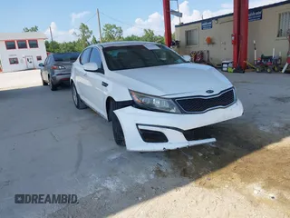 2014 Kia Optima LX with VIN 5XXGM4A7XEG320969, listed as a IAAI auction lot 39469156 with 152,615 mi miles and . Bid and sale history available at DreamBid. Image 1.