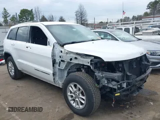 2018 Jeep Grand Cherokee Laredo E with VIN 1C4RJEAG2JC402812, listed as a IAAI auction lot 41439871 with 114,535 mi miles. Bid and sale history available at carsss.com. Image 1.