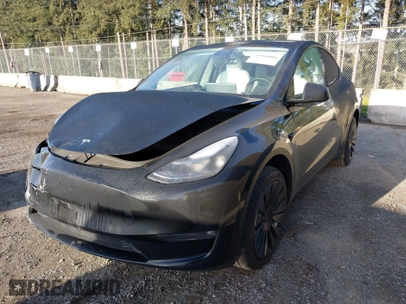 2023 Tesla Model Y Long Range z VIN 7SAYGDEE9PF637042, wystawiony jako IAAI lot #41969086 z przebiegiem 25 524 mil mil oraz . Historia ofert i sprzedaży dostępna na DreamBid. Obrazek 2.
