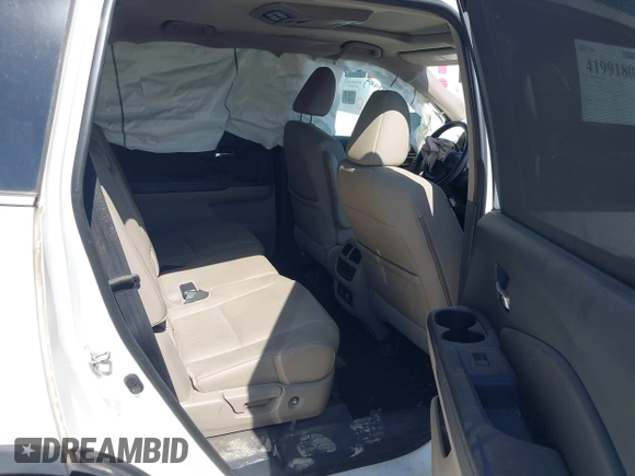 2016 Honda Pilot Touring with VIN 5FNYF6H97GB088824, listed as a IAAI auction lot 41991803 with 84,761 mi miles. Bid and sale history available at carsss.com. Image 8.