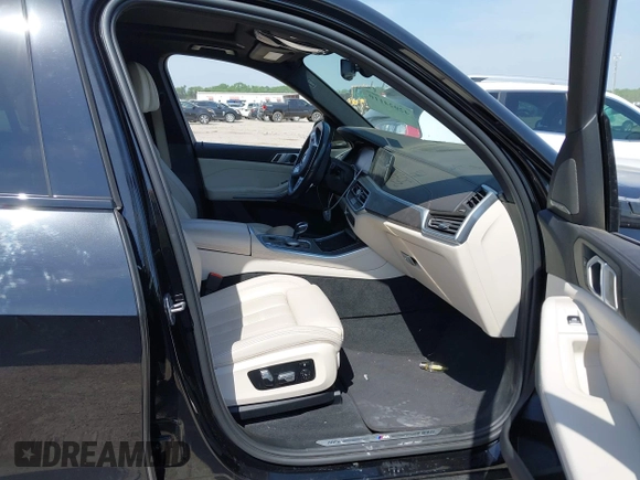 2021 BMW X5 xDrive40i with VIN 5UXCR6C01M9E66976, listed as a IAAI auction lot 42024110 with 67,877 mi miles and . Bid and sale history available at DreamBid. Image 5.