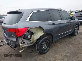 2017 Honda Pilot EX-L with VIN 5FNYF6H55HB063063, listed as a IAAI auction lot 41491193 with 75,444 mi miles and . Bid and sale history available at DreamBid. Image 4.