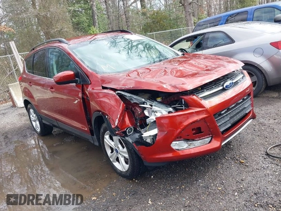 2016 Ford Escape SE with VIN 1FMCU9GXXGUB02932, listed as a IAAI auction lot 41797351 with 74,284 mi miles. Bid and sale history available at carsss.com. Image 1.