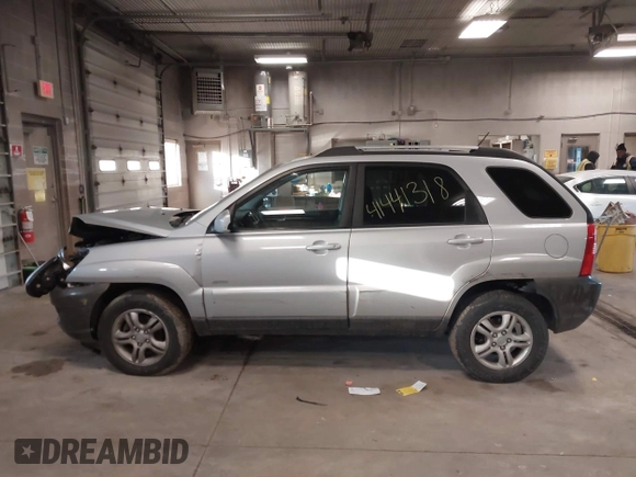 2005 Kia Sportage LX with VIN KNDJE723X57071792, listed as a IAAI auction lot 41441318 with 249,652 mi miles and . Bid and sale history available at carsss.com. Image 15.
