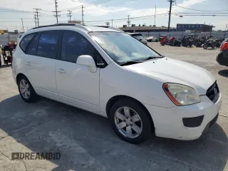 2007 Kia Rondo LX with VIN KNAFG525077072973, listed as a Copart auction lot 74268464 with 130,564 mi miles and Salvage Title. Bid and sale history available at carsss.com. Image 4.