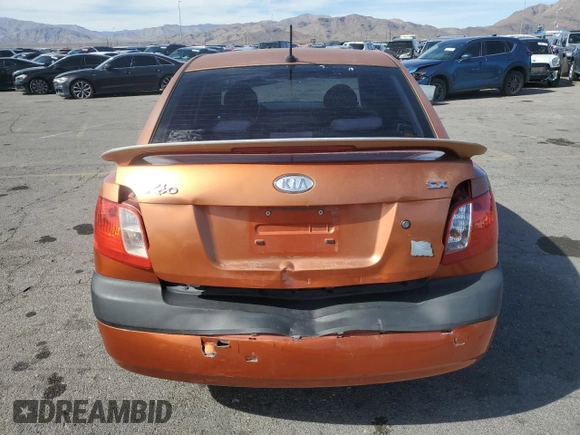 2009 Kia Rio SX with VIN KNADE223496514284, listed as a Copart auction lot 48550105 with 114,411 mi miles and Salvage Title. Bid and sale history available at carsss.com. Image 6.