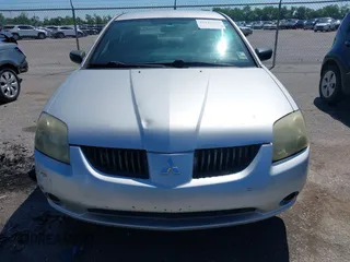 2006 Mitsubishi Galant DE z VIN 4A3AB26F56E029833, wystawiony jako IAAI lot #42145340 z przebiegiem 163 938 mil mil oraz . Historia ofert i sprzedaży dostępna na DreamBid. Obrazek 12.
