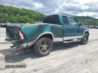 1999 Ford F-150 with VIN 1FTRX18W8XNB82710, listed as a Copart auction lot 58264745 with Not provided miles and Salvage title. Bid and sale history available at DreamBid. Image 3.