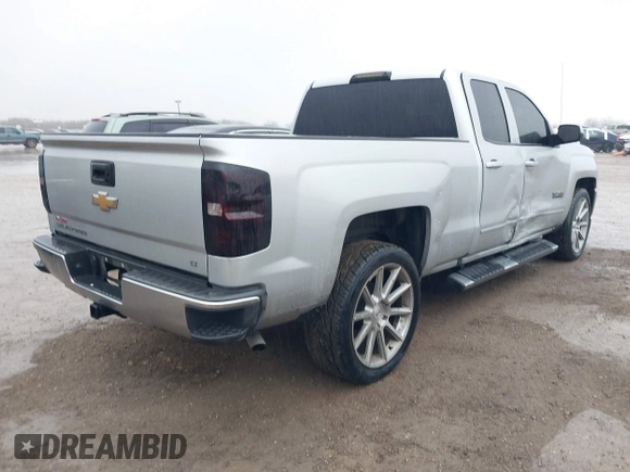 2018 Chevrolet Silverado 1500 LT with VIN 1GCRCREC4JZ287085, listed as a IAAI auction lot 41450057 with 79,275 mi miles and . Bid and sale history available at DreamBid. Image 4.