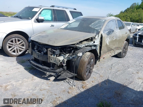 2024 Mazda CX-30 Carbon Edition with VIN 3MVDMBXY6RM649856, listed as a IAAI auction lot 41488913 with 7,350 mi miles and . Bid and sale history available at DreamBid. Image 2.