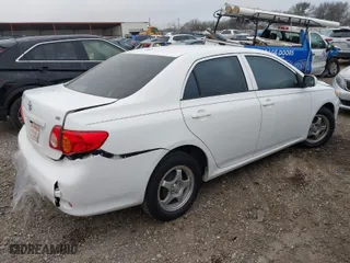 2010 Toyota Corolla with VIN JTDBU4EE6A9098537, listed as a IAAI auction lot 41501879 with 107,282 mi miles. Bid and sale history available at carsss.com. Image 4.