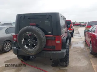 2007 Jeep Wrangler Unlimited Sahara with VIN 1J4GB59197L142223, listed as a IAAI auction lot 42025639 with 155,274 mi miles and . Bid and sale history available at DreamBid. Image 16.