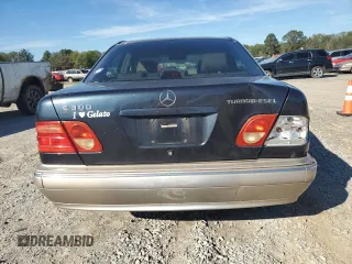 1998 Mercedes-Benz E 320 with VIN WDBJF25F3WA578364, listed as a Copart auction lot 77551834 with 228,913 mi miles and Salvage Title. Bid and sale history available at DreamBid. Image 6.