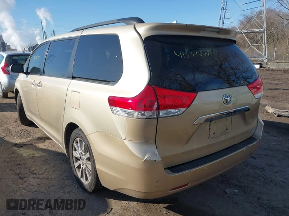 2014 Toyota Sienna Ltd with VIN 5TDDK3DCXES088559, listed as a IAAI auction lot 41534244 with 252,783 mi miles. Bid and sale history available at carsss.com. Image 3.