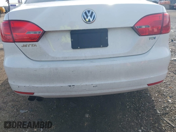 2013 Volkswagen Jetta TDI w/Premium with VIN 3VWLL7AJ6DM422102, listed as a IAAI auction lot 41956935 with 143,385 mi miles and . Bid and sale history available at DreamBid. Image 14.