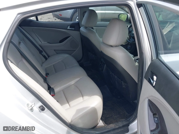 2014 Kia Optima EX with VIN 5XXGN4A79EG339431, listed as a IAAI auction lot 39792297 with 101,446 mi miles. Bid and sale history available at carsss.com. Image 8.