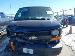 2017 Chevrolet Express Cargo Van with VIN 1GCWGBFF9H1112640, listed as a IAAI auction lot 41401549 with 157,773 mi miles. Bid and sale history available at carsss.com. Image 12.