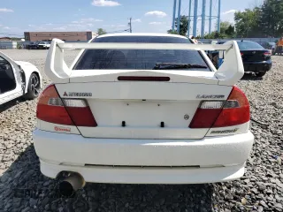 1998 Mitsubishi Lancer z VIN 000000CP9A0001997, wystawiony jako Copart lot #68862654 z przebiegiem 164 292 mil mil oraz Szkoda całkowita • Salvage title. Historia ofert i sprzedaży dostępna na DreamBid. Obrazek 6.