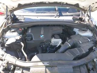 2015 BMW X1 sDrive28i with VIN WBAVM1C53FV317173, listed as a IAAI auction lot 41586385 with 146,068 mi miles. Bid and sale history available at carsss.com. Image 10.