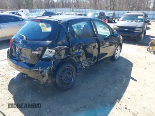 2015 Toyota Yaris L with VIN VNKKTUD37FA028691, listed as a IAAI auction lot 41645268 with 146,546 mi miles. Bid and sale history available at carsss.com. Image 4.
