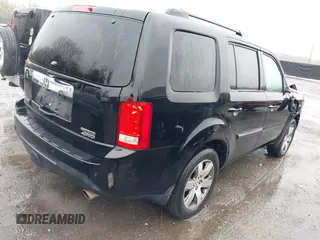 2014 Honda Pilot Touring with VIN 5FNYF4H91EB055741, listed as a IAAI auction lot 42006752 with 222,308 mi miles and . Bid and sale history available at carsss.com. Image 4.
