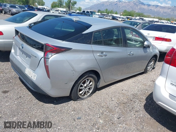 2018 Toyota Prius Two with VIN JTDKBRFU3J3068097, listed as a IAAI auction lot 42178684 with 335,391 mi miles and . Bid and sale history available at DreamBid. Image 4.