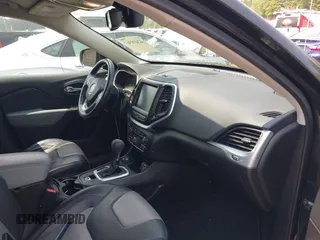 2014 Jeep Cherokee Limited z VIN 1C4PJMDS2EW247443, wystawiony jako IAAI lot #42439367 z przebiegiem 134 911 mil mil oraz . Historia ofert i sprzedaży dostępna na DreamBid. Obrazek 5.