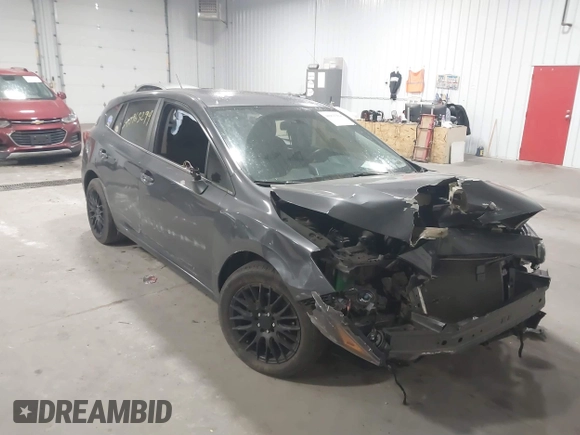 2018 Subaru Impreza with VIN 4S3GTAA65J3713216, listed as a IAAI auction lot 40963294 with 94,176 mi miles and . Bid and sale history available at DreamBid. Image 6.