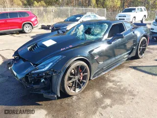 2019 Chevrolet Corvette Grand Sport 1LT with VIN 1G1YV2D70K5105479, listed as a IAAI auction lot 40877585 with 57,936 mi miles. Bid and sale history available at carsss.com. Image 2.