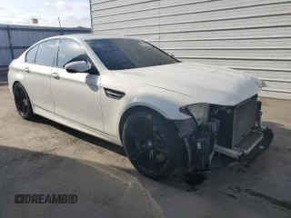 2014 BMW M5 with VIN WBSFV9C54ED097462, listed as a Copart auction lot 70482504 with 76,501 mi miles and Clean Title. Bid and sale history available at carsss.com. Image 4.