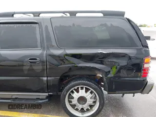 2002 Chevrolet Suburban LT with VIN 3GNFK16Z72G165792, listed as a IAAI auction lot 41921486 with 237,675 mi miles. Bid and sale history available at carsss.com. Image 6.