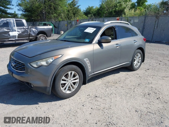 2011 Infiniti FX35 with VIN JN8AS1MW0BM141914, listed as a IAAI auction lot 42151160 with 211,708 mi miles. Bid and sale history available at carsss.com. Image 2.