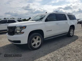 2015 Chevrolet Suburban LT with VIN 1GNSKJKC7FR168536, listed as a Copart auction lot 62067425 with 222,282 mi miles and Salvage title. Bid and sale history available at DreamBid. Image 1.