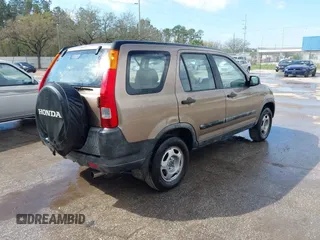 2003 Honda CR-V LX with VIN JHLRD68513C009276, listed as a IAAI auction lot 41563452 with 240,519 mi miles and . Bid and sale history available at DreamBid. Image 4.