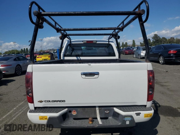 2012 Chevrolet Colorado Work Truck with VIN 1GCCSBF9XC8145058, listed as a Copart auction lot 57133065 with 261,719 mi miles and Salvage title. Bid and sale history available at DreamBid. Image 6.