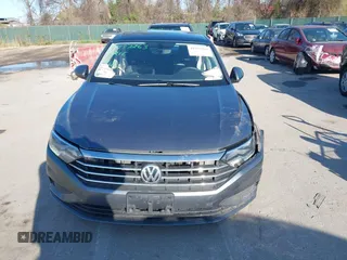 2021 Volkswagen Jetta S z VIN 3VWC57BU7MM050305, wystawiony jako IAAI lot #41937263 z przebiegiem 41 241 mil mil oraz . Historia ofert i sprzedaży dostępna na DreamBid. Obrazek 13.