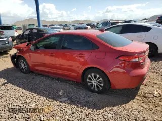 2021 Toyota Corolla Hybrid LE with VIN JTDEAMDE0MJ003030, listed as a Copart auction lot 51829235 with 82,907 mi miles and Salvage Title. Bid and sale history available at carsss.com. Image 2.