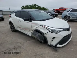 2020 Toyota C-HR LE with VIN JTNKHMBX3L1087972, listed as a Copart auction lot 51804715 with 57,738 mi miles and Salvage Title. Bid and sale history available at DreamBid. Image 4.