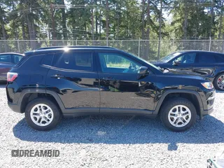 2018 Jeep Compass Sport with VIN 3C4NJDAB1JT261863, listed as a IAAI auction lot 42677037 with 93,263 mi miles and . Bid and sale history available at DreamBid. Image 13.