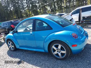 2004 Volkswagen New Beetle Coupe Satellite Blue with VIN 3VWGK31C14M420613, listed as a IAAI auction lot 42046048 with 117,274 mi miles. Bid and sale history available at carsss.com. Image 14.